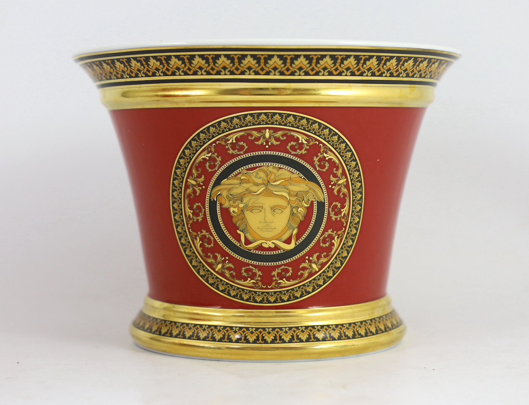 Rosenthal for Versace. A graduated pair of Medusa pattern jardinieres 19.5cm and 14.5cm high